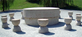 The stone carved table with 12 stools